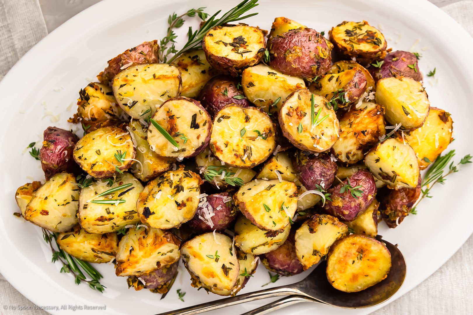 Roasted Whole Baby Potatoes with Rosemary Recipe and Video - Eat Simple Food