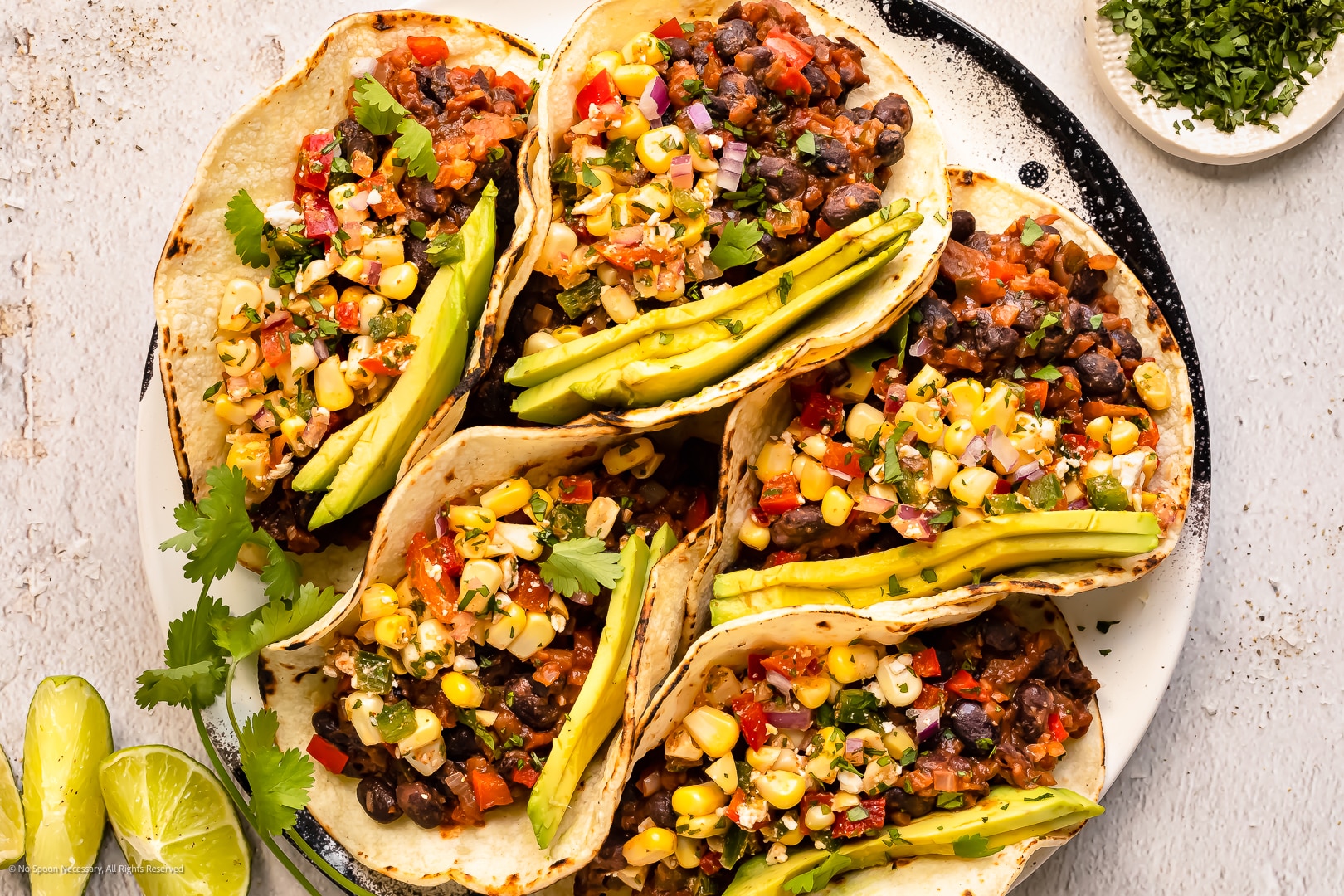 vegan nopales tacos with charred corn and black bean salsa